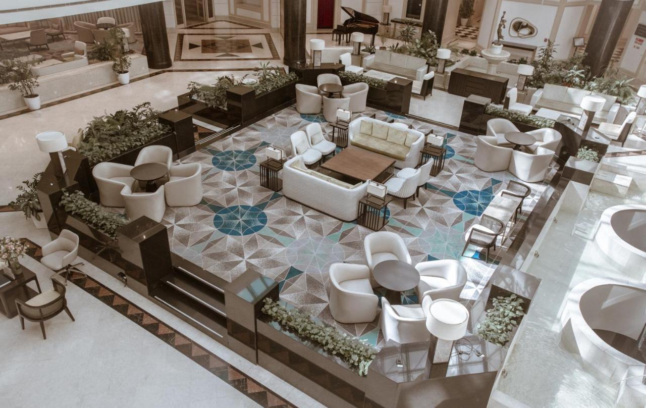 International Hotel Tashkent Exterior photo The lobby of the hotel